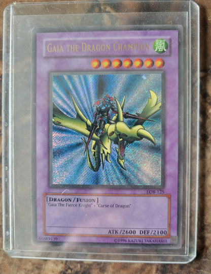 Authentic 1999 Edition LOB-125 "Gaia The Dragon Champion" Yugioh Card Ultra Rare Holographic Limited Edition Near Mint Plastic Sleeve Since New