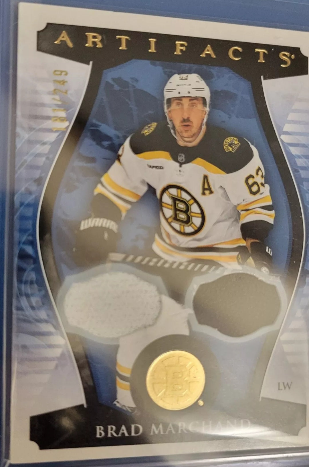 2023 Upper Deck Artifacts Gold Dual Jersey 22 Brad Marchand Numbered 181/249