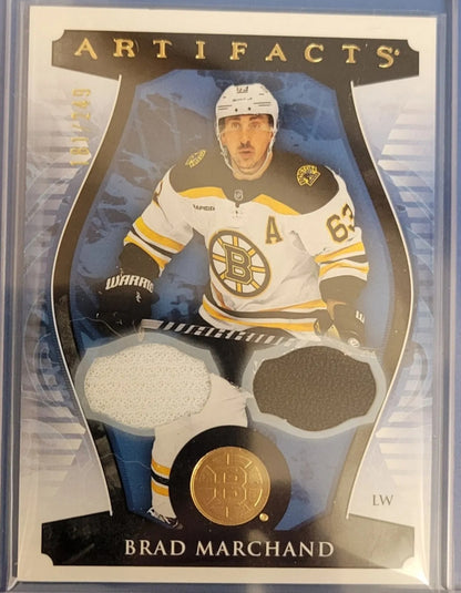 2023 Upper Deck Artifacts Gold Dual Jersey 22 Brad Marchand Numbered 181/249