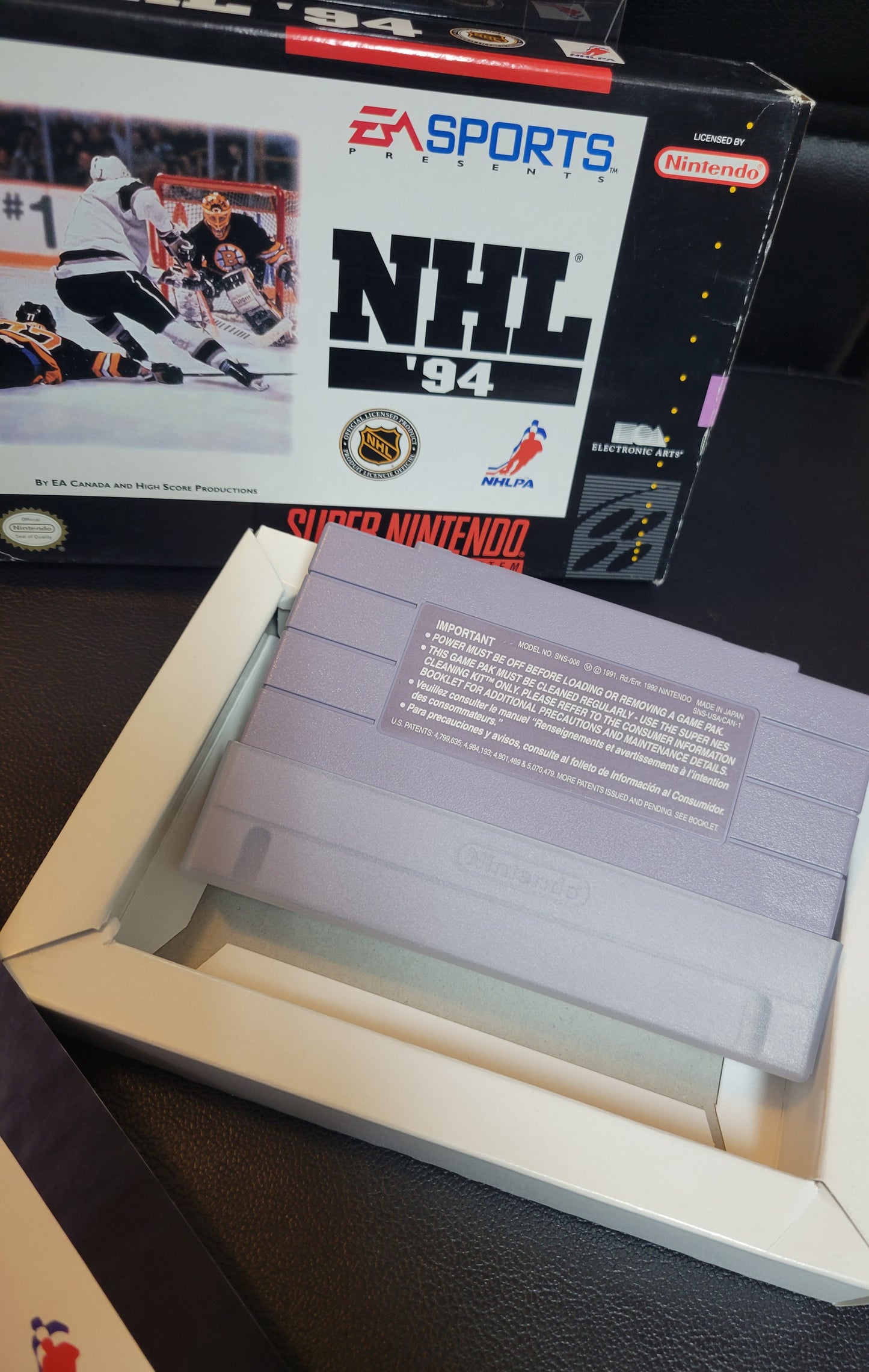 NHL 94' (SNES) - Super Nintendo Ent. 1994 IMMACULATE Condition - CWB Box + Manual + Protector