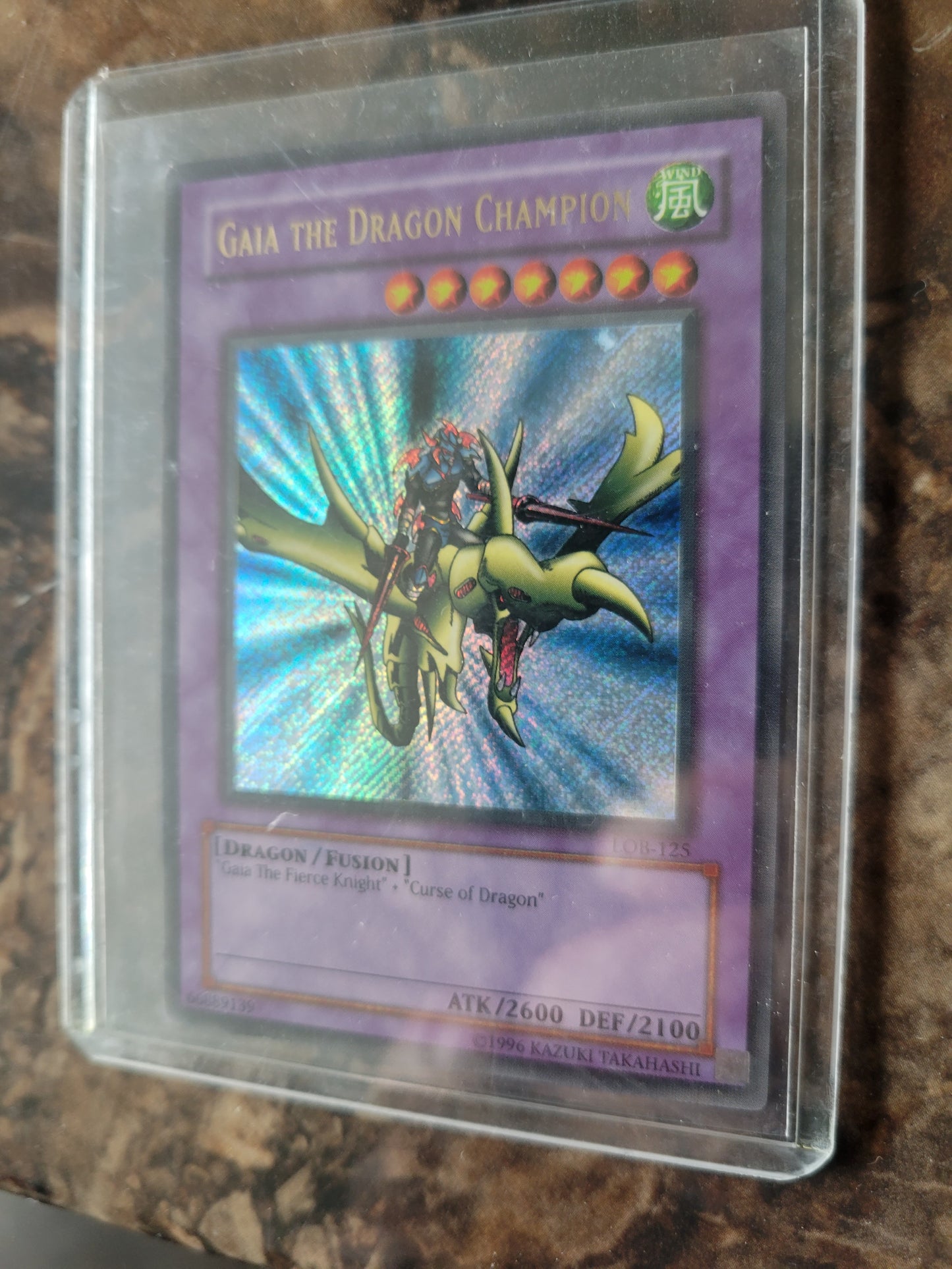 Authentic 1999 Edition LOB-125 "Gaia The Dragon Champion" Yugioh Card Ultra Rare Holographic Limited Edition Near Mint Plastic Sleeve Since New