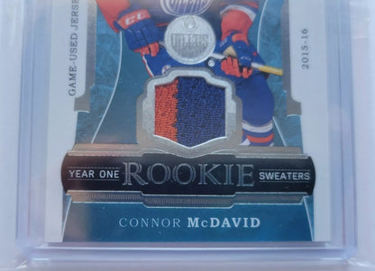 2015 2016 CONNOR MCDAVID ARTIFACTS HOCKEY YEAR ONE ROOKIE SWEATERS GAME USED BGS 9 MINT