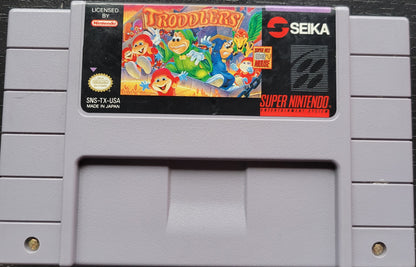 TRODDLERS Authentic - SNES - Super Nintendo Ent. System NTSC Cartridge + Protector