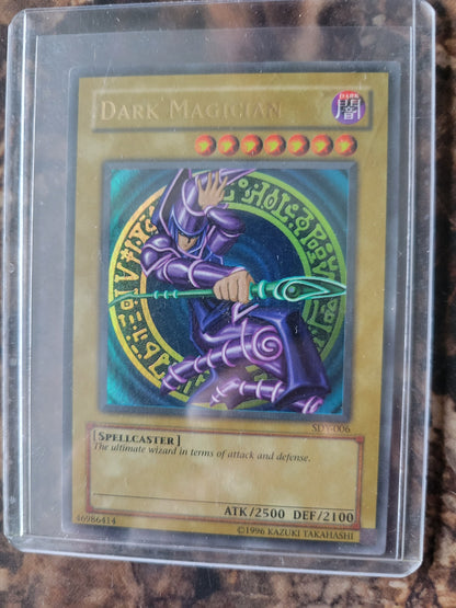 Authentic 1st Edition SDY-006 "Dark Magician" Yugioh Card Base Set Ultra Rare Holographic Limited Edition Near Mint Plastic Sleeve Since New