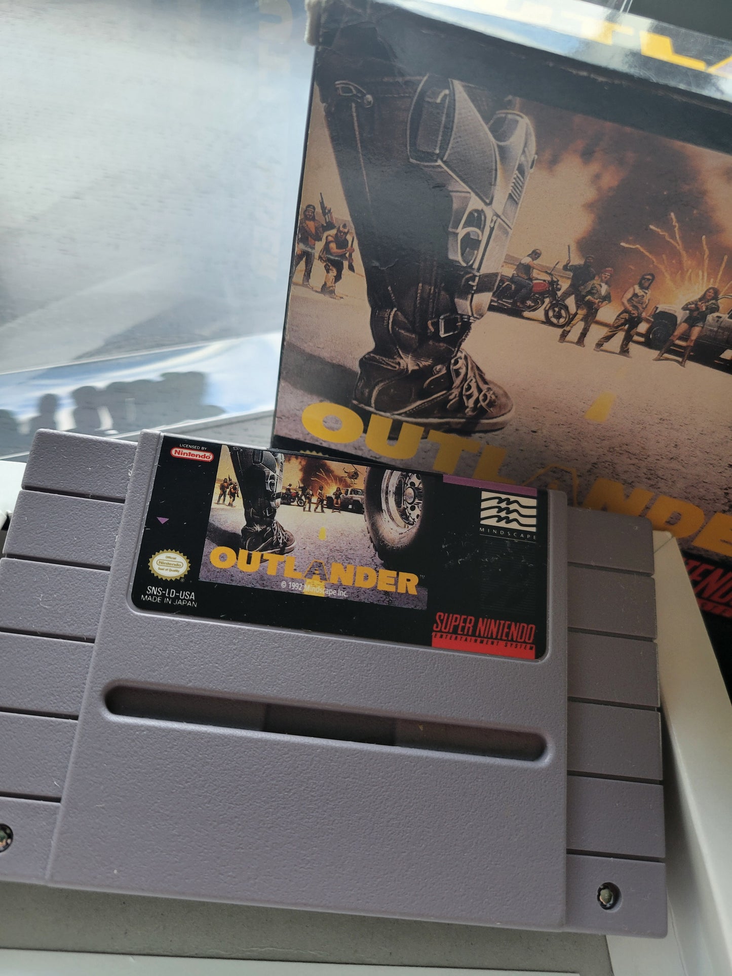 OUTLANDER CWB Complete With Box - SNES - Super Nintendo Ent. System NTSC Cartridge + Plastic Protector