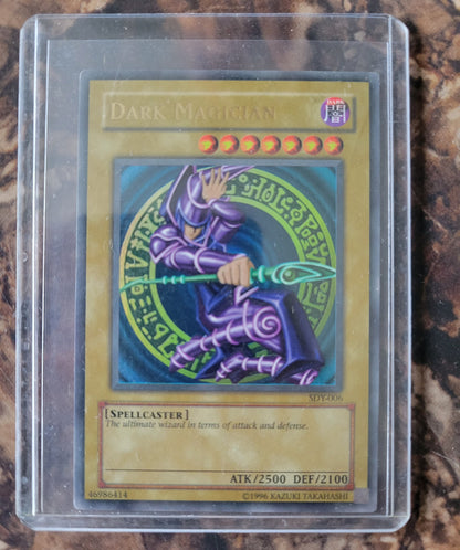 Authentic 1st Edition SDY-006 "Dark Magician" Yugioh Card Base Set Ultra Rare Holographic Limited Edition Near Mint Plastic Sleeve Since New