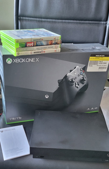 XBOX ONE X CONSOLE 1TB + 4 Games + BOX + Hook Up Cords (No Controller)