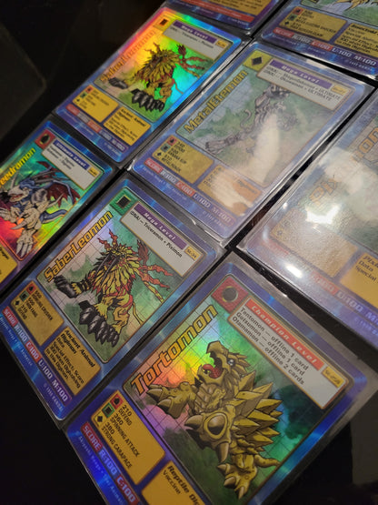 1999 Lot Of 9 HOLO BANDAI: DIGIMON Including One 1st Edition Holographic Trading Cards