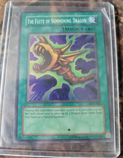 Authentic 1999 Edition SDK-042 "FluteOfSummoningDragon" Yugioh Card Ultra Rare Holographic Limited Edition Near Mint Plastic Sleeve Since New