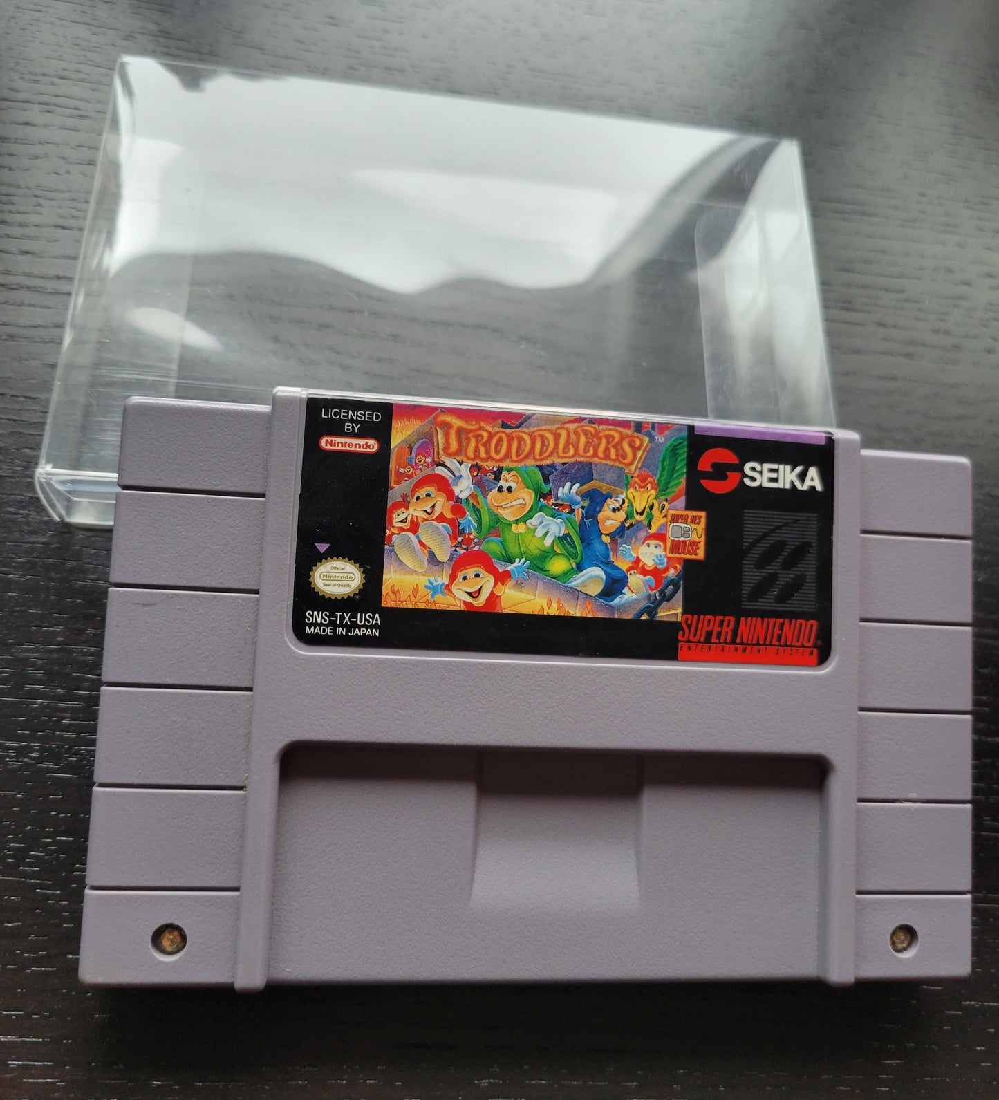 TRODDLERS Authentic - SNES - Super Nintendo Ent. System NTSC Cartridge + Protector